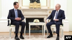 د روسیې ولسمشر ولادیمیر پوتین (ښی) او د سوریې ولسمشر بشارالاسد