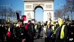 Yellow vest protesters gather at the Arc de Triomphe in Paris, France, Feb. 23, 2019.