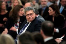 FILE - Attorney General William Barr arrives before President Donald Trump speaks in the East Room of the White House about his judicial appointments, Nov. 6, 2019, in Washington.