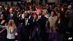Republican presidential candidate Donald Trump shown during a church service at Great Faith Ministries, Saturday, Sept. 3, 2016.