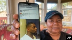 Glenda Brown Thomas displays a photo of her nephew, Andrew Brown Jr., on her cell phone at her home in Elizabeth City, N.C., April 22, 2021.