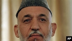 Afghan President Hamid Karzai during a press conference in Kabul, during which he said that once or twice a year Iran gives his office $700,000 to $975,000 for official presidential expenses, 25 Oct 2010