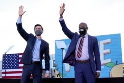 USA-ELECTION/GEORGIA-BIDEN Jon Ossoff and Raphael Warnock