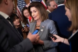 House Speaker Nancy Pelosi speaks with members of the media following a news conference on Hong Kong Human Rights on Capitol Hill in Washington, Sept. 18, 2019.