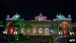 FILE - The Kings Romans Chinese casino in Ton Pheung, a special economic zone set in northwestern Laos along the Mekong river, is seen at the border with Thailand and Myanmar, April 8, 2015. 