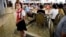 A young North Korean student waits in the dining hall of the Ongnyugwan, a popular noodle restaurant, Sept. 1, 2014 in Pyongyang