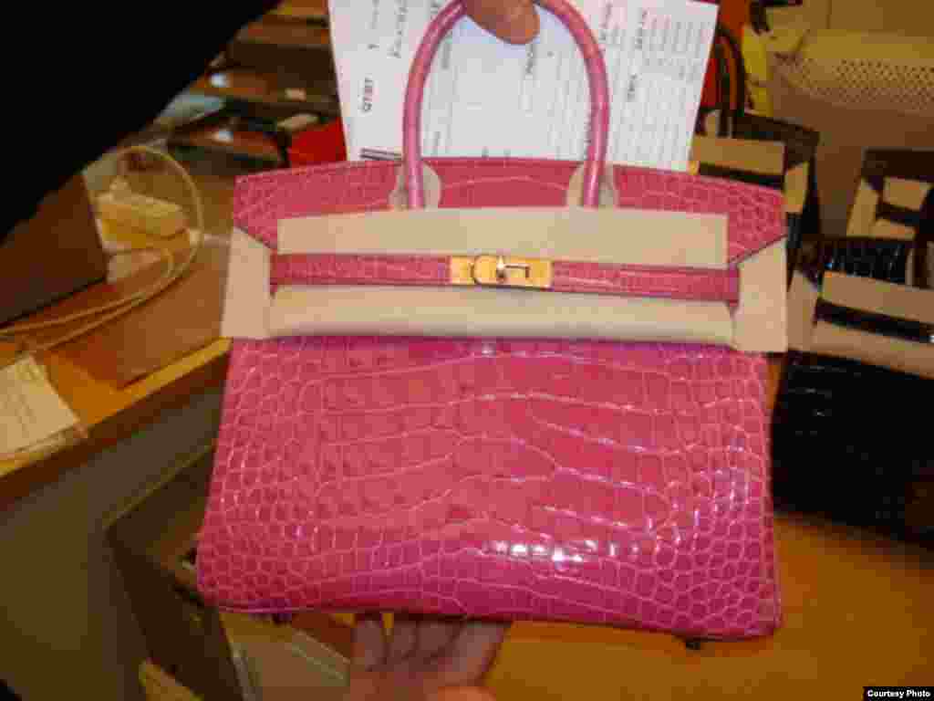 This Birkin bag by Hermes is made from one of Mark Glass’ alligators and sells for $100,000 (Courtesy Mark Glass) 