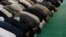 Men pray at the Baitul Futuh Mosque in Morden, south London, September 21, 2012. 
