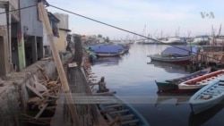 Residents of Impoverished Jakarta Neighborhoods Protest Eviction