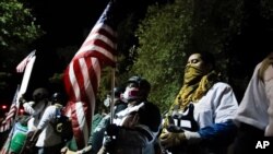 Military veterans participate in a Black Lives Matter protest at the Mark O. Hatfield United States Courthouse July 30, 2020, in Portland, Ore.