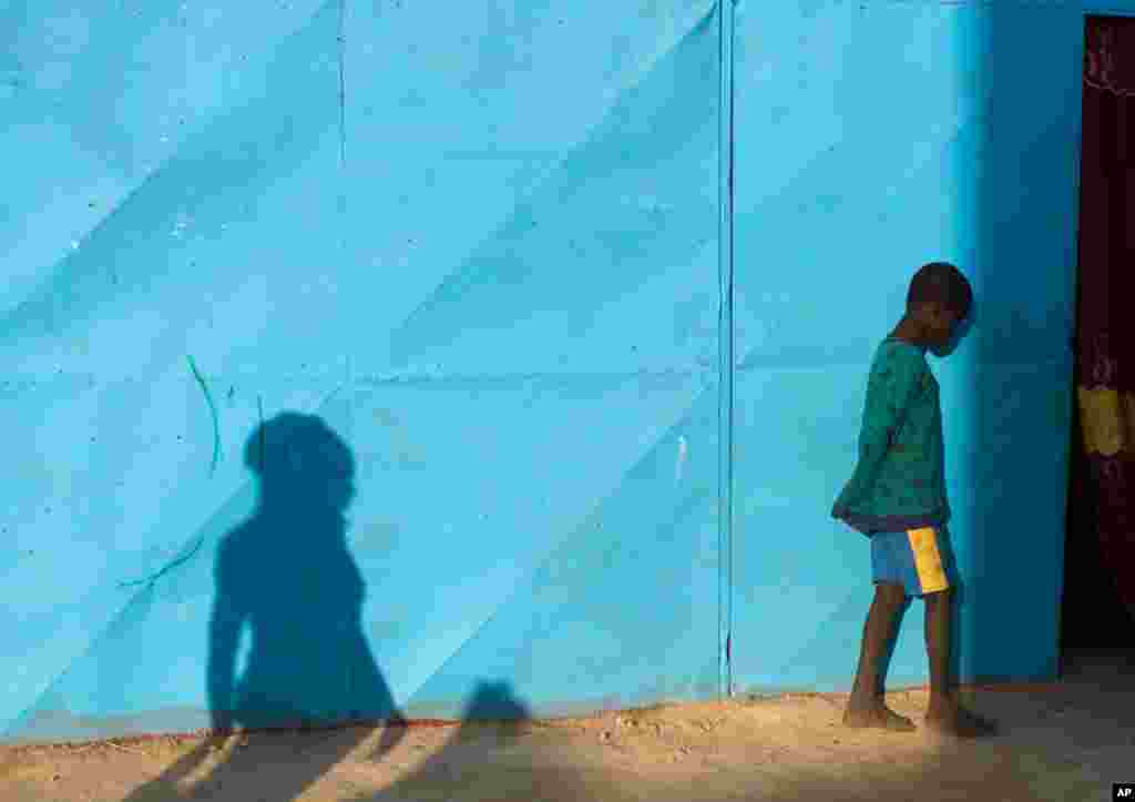 A boy who fled northern Mali is seen at a camp for internally displaced persons in Sevare, Mali, January 23, 2013.