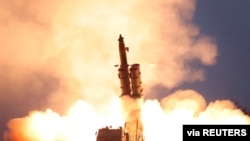 A projectile is fired during North Korea's missile tests in this undated picture released by North Korea's Central News Agency (KCNA) on November 28, 2019.