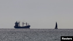 A U.S.-flagged cargo vessel carrying aid for Palestinian civilians caught in the conflict between Israel and Hamas sets sail from Larnaca, Cyprus, May 9, 2024.