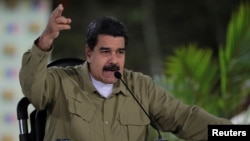 Venezuela's President Nicolas Maduro speaks during his weekly broadcast "Los Domingos con Maduro" (The Sundays with Maduro) in Caracas, Venezuela Aug. 6, 2017. 