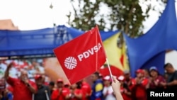 Varias personas participan en una manifestación contra la corrupción y en apoyo a la industria petrolera en Caracas, Venezuela, el 25 de marzo de 2023. REUTERS/Leonardo Fernandez Viloria