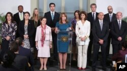 Peru's Foreign Minister Cayetano Aljovin speaks surrounded by other Foreign Ministers of the Lima Group after a private meeting concerning Venezuela in Lima, Peru, Feb. 13, 2018. The Lima Group met to weigh further action against Venezuelan President Nico