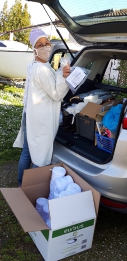 Preparing an order of face masks in France's southwestern Gironde region.