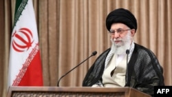 FILE - A handout picture provided by the office of Iran's supreme leader, Ayatollah Ali Khamenei, on May 2, 2021, shows him giving a live televised speech in Tehran.
