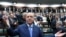 Turkish President Tayyip Erdogan greets members of his ruling AK Party (AKP) during a meeting at the parliament in Ankara, Turkey May 18, 2022. (Handout photo via Reuters)