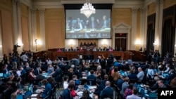 A video of former Attorney General William Barr speaking is shown on a screen as the House select committee tasked with investigating the January 6th attack on the Capitol hold a hearing on Capitol Hill on June 13, 2022.