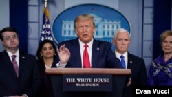 President Donald Trump speaks during press briefing with the Coronavirus Task Force, at the White House, March 18, 2020, in Washington. 