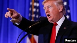 FILE - U.S. President-elect Donald Trump speaks during a press conference in Trump Tower, Manhattan, New York, Jan. 11, 2017.
