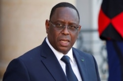 Senegal's President Macky Sall leaves after meeting with French President Emmanuel Macron at the Elysee Palace in Paris, May 15, 2019.