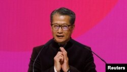 Hong Kong Financial Secretary Paul Chan speaks during a ceremony marking the first day of trade after Lunar New Year at the Hong Kong stock exchange in Hong Kong, China February 8, 2019.