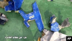 This picture posted Saturday, May 21, 2016, on the official Facebook page of the Egyptian Armed Forces spokesman shows part of the wreckage from EgyptAir flight 804.