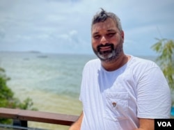 Rodwan El Ali, director of Oceanium and the underwater exhibit in Dakar, Senegal, poses for a portrait June 20, 2022. (Annika Hammerschlag/VOA))