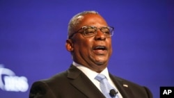 U.S. Defense Secretary Lloyd Austin speaks during the 19th International Institute for Strategic Studies Shangri-la Dialogue — Asia's annual defense and security forum — in Singapore, June 11, 2022.