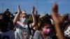 FILE - Anti-government protesters rally against ongoing food shortages and high prices, at the Maximo Gomez monument in Havana, Cuba, July 11, 2021. A woman serving eight years in prison in relation to the protests says prison officials tried to force her to have an abortion.