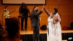 LaTonya Whitaker and her husband David attend the Juneteenth event at the Tokyo American Club in Tokyo, Japan, June 18, 2022.
