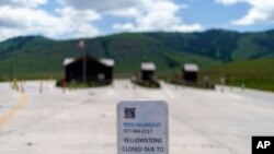 The entrance to Yellowstone National Park sits closed due to the historic floodwaters on June 15, 2022, in Gardiner, Mont.