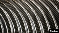 FILE - Part of a turbine is seen at a Siemens plant in Goerlitz, Germany, July 15, 2019. 