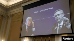 An audio recording of a phone call between former U.S. President Donald Trump and Georgia Secretary of State Brad Raffensperger is played during the fourth hearing of the U.S. House Select Committee on Capitol Hill in Washington, U.S. June 21, 2022.