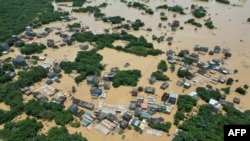 This aerial photo shows a flooded area after heavy rains in Yingde, Qingyuan city, in China's southern Guangdong province, June 23, 2022. 