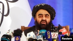 FILE - Taliban Foreign Minister Amir Khan Muttaqi speaks during a news conference in Kabul, Afghanistan, Sept. 14, 2021.