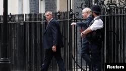 British Prime Minister Boris Johnson walks outside Downing Street in London, Britain, July 5, 2022.