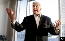 FILE - Wealth manager Ed Butowsky poses at his office in Dallas, Texas, Dec. 17, 2010.