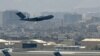 A U.S. Air Force aircraft takes off from the airport in Kabul on August 30, 2021.