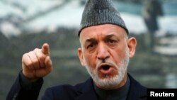 Afghan President Hamid Karzai speaks during a news conference in Kabul, May 4, 2013.