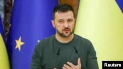 FILE - Ukraine's President Volodymyr Zelenskyy speaks in Kyiv, Ukraine, Sept. 20, 2024. Zelenskyy said Saturday that the end of the more than 2-1/2-year-old war with Russia depended on the "resolve" of Kyiv's Western allies in providing needed weaponry and permission to use it.