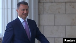 FILE - Macedonia's former prime minister Nikola Gruevski enters the court in Skopje, Macedonia, Oct. 5, 2018