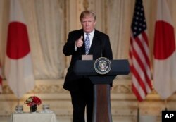 President Donald Trump said he agreed with Japanese Prime Minister Shinzo Abe that maximum pressure would continue to be applied on Pyongyang until it gives up its nuclear weapons.