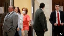 Congregants arrive for an evening service at the Life Tabernacle Church in Central, La., where Pastor Tony Spell says he will keep violating a ban on gatherings because God told him to, March 31, 2020.