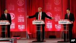 Republican presidential candidates, Donald Trump, Sen. Ted Cruz, left, and Sen. Marco Rubio, right, during the Republican presidential debate at the Peace Center, Feb. 13, 2016, in Greenville, S.C.