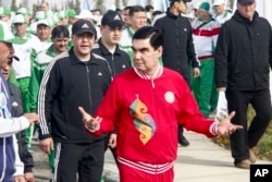FILE - Turkmen President Gurbanguli Berdymukhamedov attends the opening ceremony of a new sports complex at the new tourist zone of Awaza on the Caspian Sea in Turkmenistan, April 7, 2017. Turkmenistan is hosting the fifth Asian Indoor and Martial Arts Ga