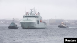 The Royal Canadian Navy's offshore patrol vessel HMCS Harry DeWolf returns after completing a circumnavigation of North America, including the arctic Northwest Passage, to its home port of Halifax, Nova Scotia, Canada, Dec. 16, 2021.