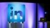 FILE - The LinkedIn logo is displayed during a product announcement in San Francisco, Sept. 22, 2016.